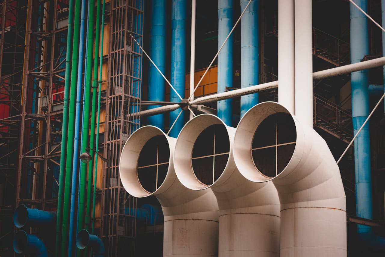 services-02 Close-up of vibrant colored pipes on the exterior of Centre Pompidou, Paris.